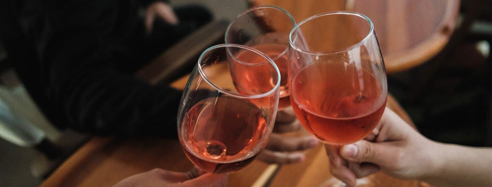 Guests raising glasses of rosé at Dulles