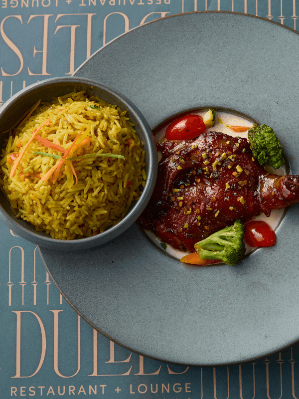 Glazed beef with spiced rice on a Dulles plate